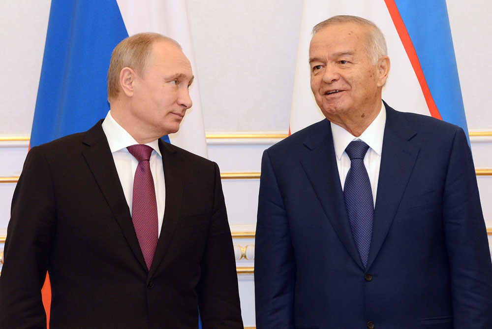 Путин поздравил Каримова с победой на выборах
